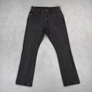 Vintage 1990s Levi's 562 Subtle Flare Black Denim Red Tab Jeans Fit 31 x 33